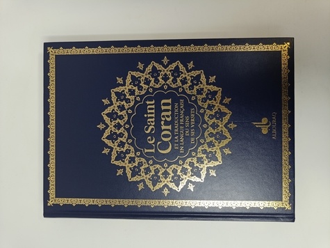 Le Saint Coran et la traduction en langue française du sens de ses versets. Couverture daim bleu