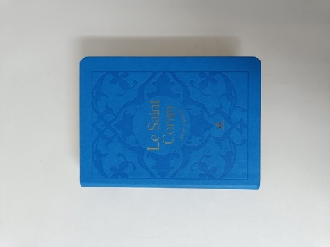 Le Saint Coran et la traduction en langue française du sens de ses versets. Couverture tissu bleu-gris