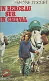 Evelyne Coquet - Un berceau sur un cheval.