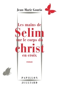 Jean-Marie Gourio - Les mains de Selim sur le corps du Christ en croix.
