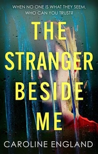 Caroline England - The Stranger Beside Me - A gripping twisty thriller which will leave you asking yourself: who can you trust?.