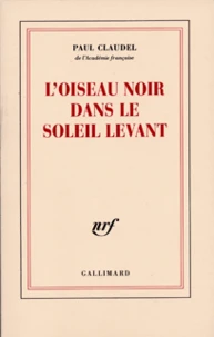 L'Oiseau Noir Dans Le Soleil Levant