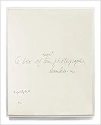 A box of ten photographs