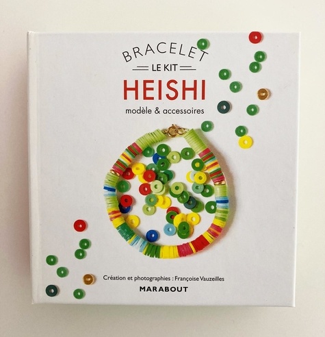 Le kit bracelet Heishi. Modèle et accessoires. Avec 20 cm de perles Heishi multicolores, 2 perles rondes en métal, 1 fermoir à ressort et 1 anneau, 40 cm de fil transparent élastique et 1 livre d'explications
