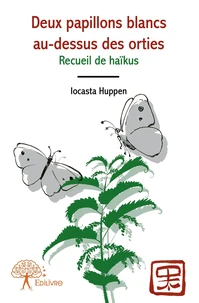 Deux papillons blancs au-dessus des orties