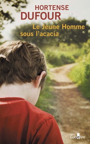 Couverture de Le jeune homme sous l'acacia : roman