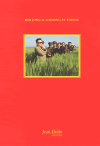 Kim Jong Il looking at things