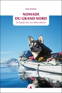 Kim Hafez - Nomade du Grand Nord - En kayak avec un chien esquimo.