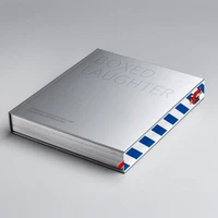 Boxed laughter : 12 years of the laughting cow collectors