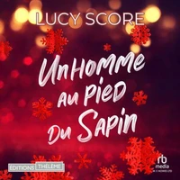 Un homme au pied du sapin