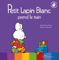 Petit lapin blanc prend le train