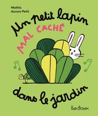 Un petit lapin mal caché dans le jardin