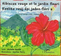 Hibiscus rouge et jardin fleuri