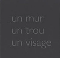 Un mur un trou un visage