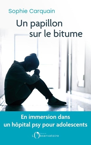 Un Papillon Sur Le Bitume