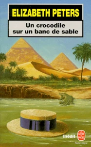Un crocodile sur un banc de sable