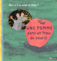 Une pomme dans un trou de souris