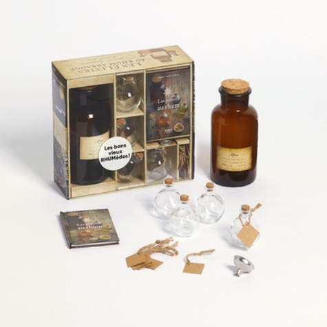 Coffret Les élixirs au rhum arrangé. Avec 1 bocal de 500 ml ; 4 fioles ; 1 entonnoir ; des étiquettes et des ficelles