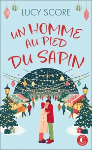 Un homme au pied du sapin