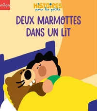 Deux marmottes dans un lit
