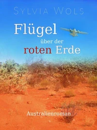Flügel über der roten Erde