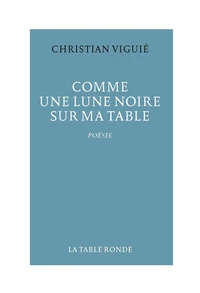 Comme une lune noire sur ma table