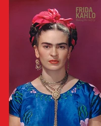 Frida Kahlo making herself up